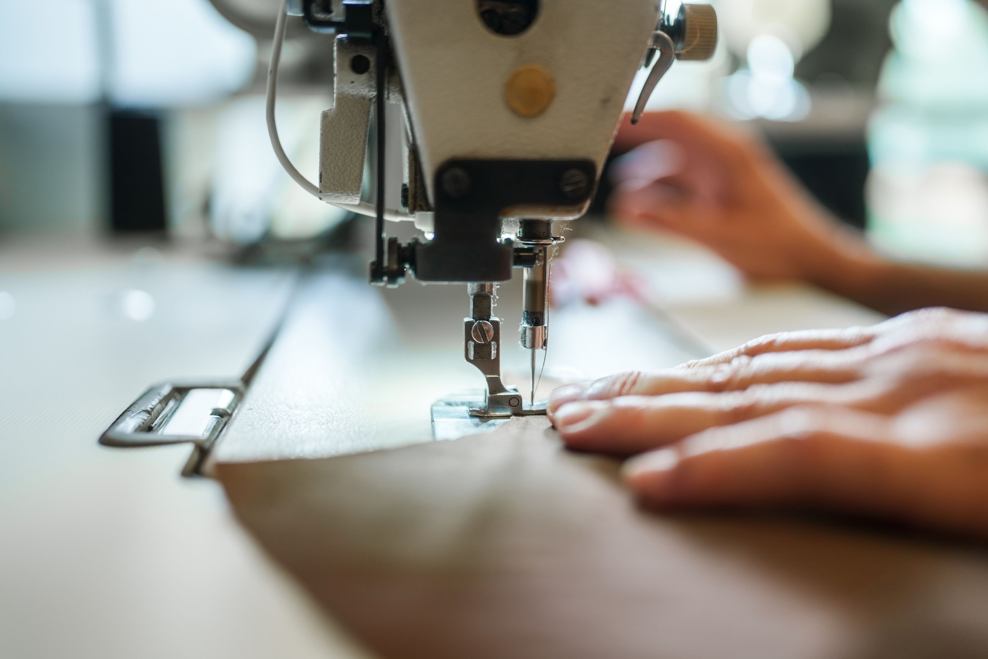Close up to sewing on a sewing machine Close up to sewing on a sewing machine
